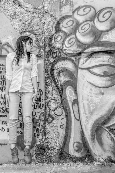 Singer songwriter Allison Rose photographed by David Lee Black with graffiti at Fort Wetherill, Rhode Island.